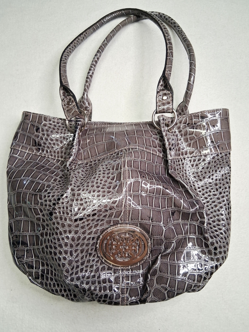 Kathy Van Zeeland croc-embossed patent faux-leather tote bag.